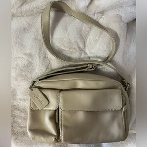Genuine leather beige bag in perfect condition with Jessica brand